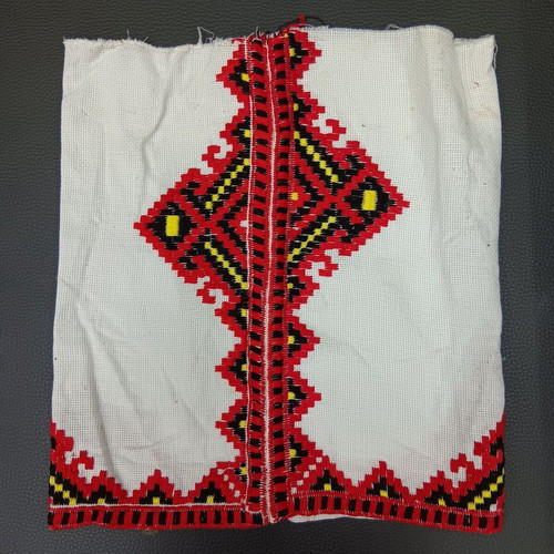Collectible traditional fabric with embroidered pattern No 114 used