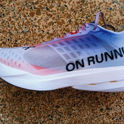 On Cloudboom Strike running shoes, white and red, size 39