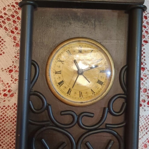 Vintage decorative tabletop clock with wooden and wrought iron details