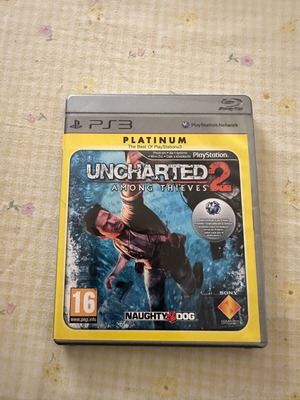 Uncharted 2 Platinum Edition като нов, с книжката му