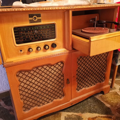 Cabinet with built-in turntable and radio used