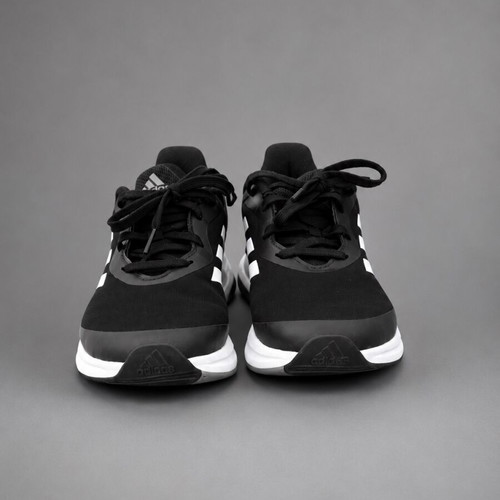 Adidas black athletic shoes with white details