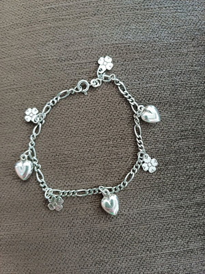 Silver bracelet new with hearts and four-leaf clovers 19 cm