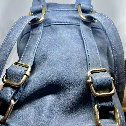 Mini backpack dark green petrol used, washed leather