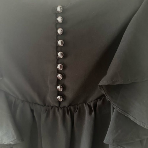 Black dress with ruffles used, size medium