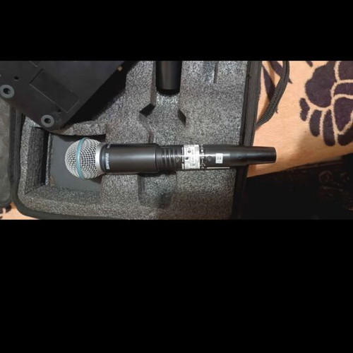 Shure Beta 58a GLXD4 wireless microphone used with case