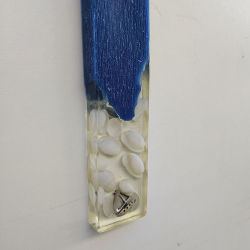 Candle with seashells in liquid glass new