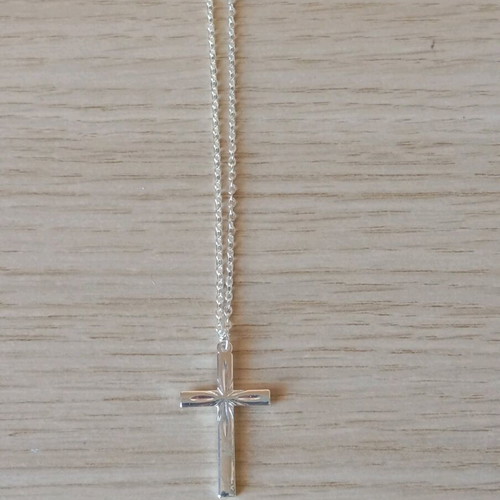 Steel cross like new, silver color