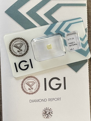 Natural Fancy Light Yellow Diamond 0.71ct VS1 IGI Certified