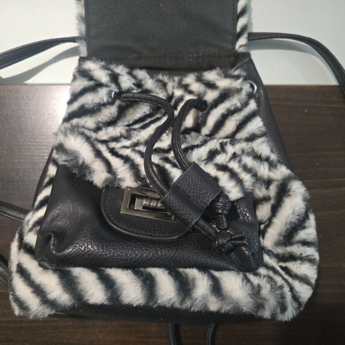 Children's backpack used, black and white