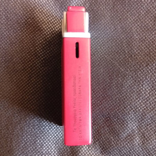 Prince lighter red metal promotional like new