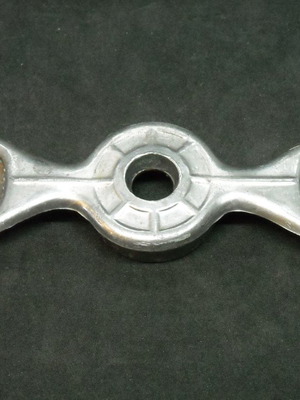Vintage aluminum double bottle opener used