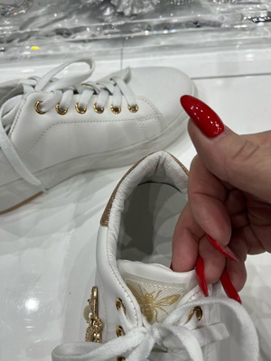 Women's athletic shoes used, white with gold details, size 39