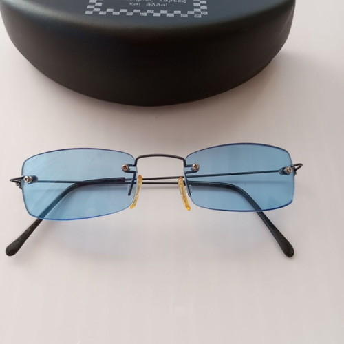 Vintage Y2K Sunglasses with Blue Lenses and Collectible PezeRva Case like new