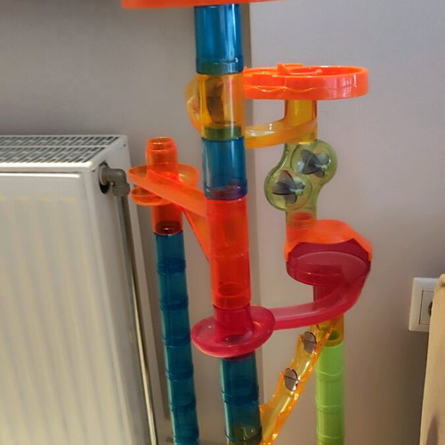 Marble run toy used, assembly game with 10 marbles