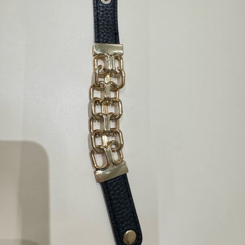 Women's bracelet like new, metal and black leather