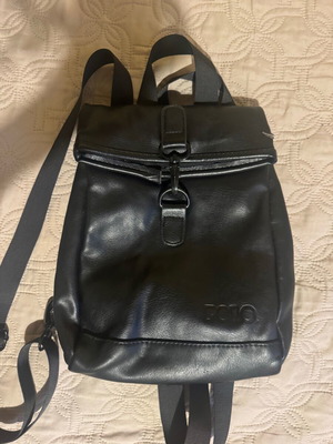 Polo backpack black used with a tear
