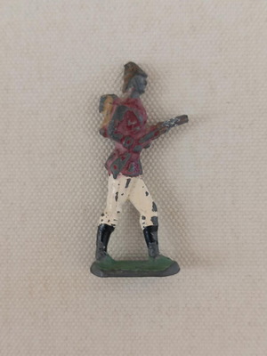 Lead soldier figure used with paint wear