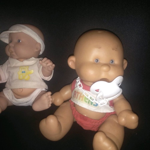 Baby dolls new, set of two mini with clothes and button function