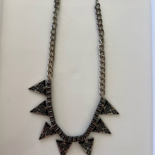 Necklace with metal elements like new, black and gold