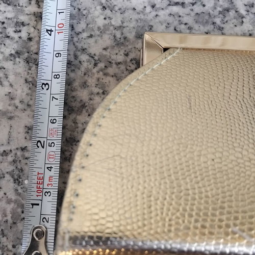 Gold evening clutch bag with rhinestones and metal frame