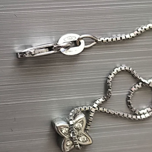 White gold 18K cross with 5 brilliant cut diamonds like new
