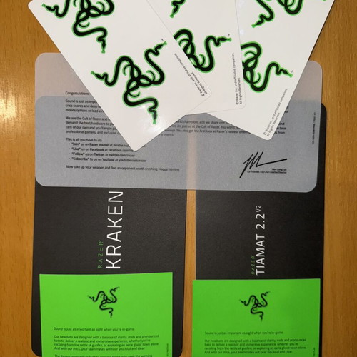 Razer stickers and headphone manuals, pack