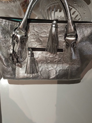 Tous leather handbag like new, silver