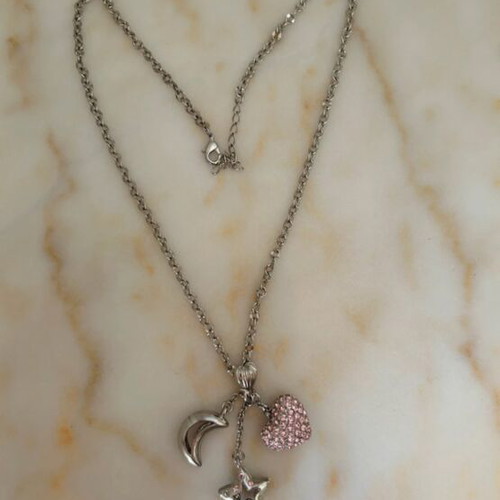 Silver necklace like new with three pendants heart, star and moon