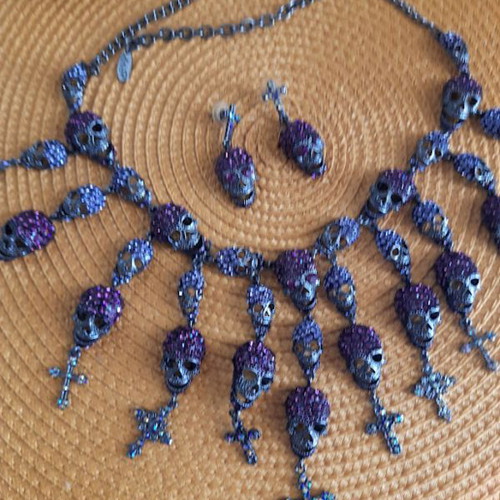 Earrings and necklace set with thousands of zircons like new