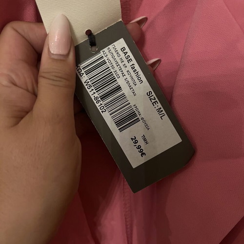 Pink sleeveless vest like new, very light