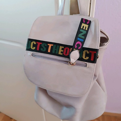 Backpack like new, light gray color