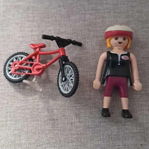 Playmobil woman with bicycle figure