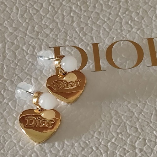 Christian Dior tribal gold heart drop earrings like new