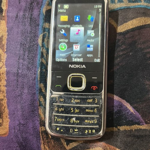 Nokia 6700c-1 used, English menu, no charger, gray