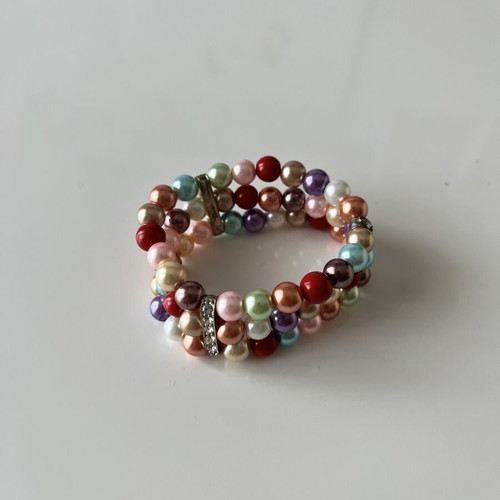 Multicolor beaded bracelet with silver-tone spacers, layered design