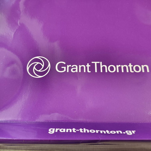 Grant Thornton promotional set with notebook, pen, lanyard, pouch