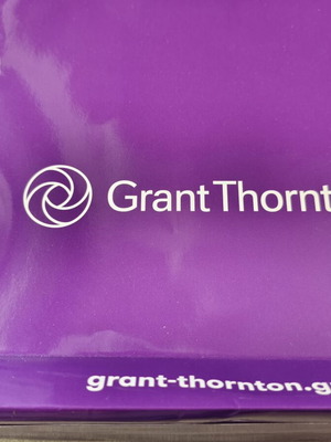 Grant Thornton promotional set with notebook, pen, lanyard, pouch