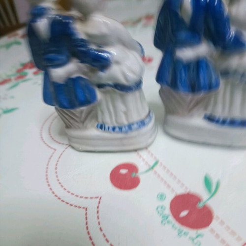 White porcelain figurines like new, set of 2 with blue and gold