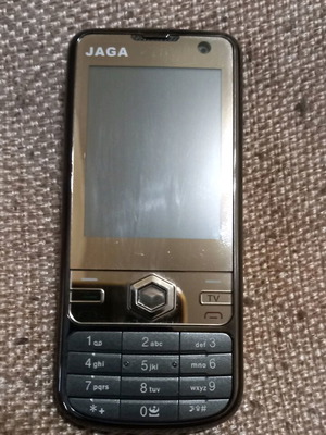 JAGA mobile phone used for spare parts without battery
