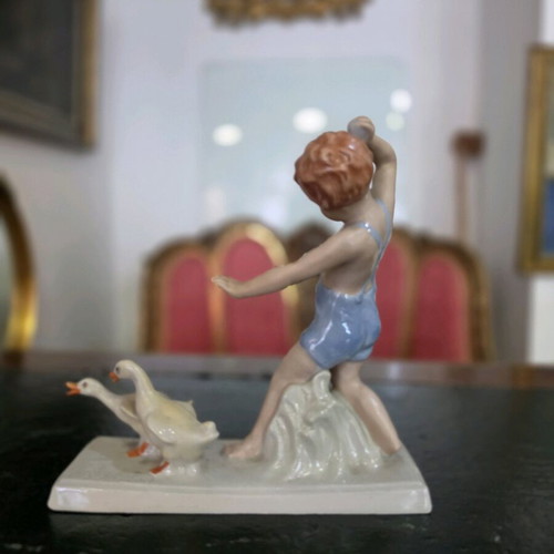 Royal Dux porcelain figurine child with geese used