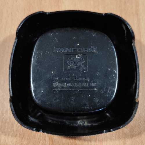 Ouzo 12 square black plastic ashtray used