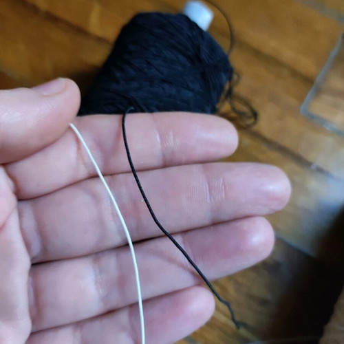 Elastic thread new, black and white, two spools