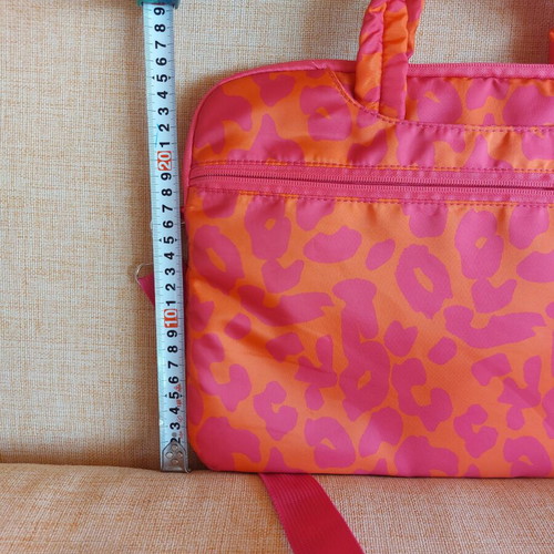 Laptop bag like new with multiple compartments and leopard print