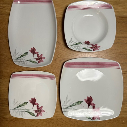 Complete dinnerware set, 12 large, 12 deep, 11 small plates, 2 platters