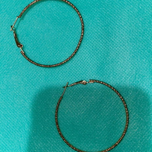 Women's hoop earrings like new, gold-colored