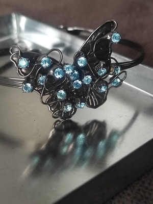 Artwear Dimitriadis bracelet with butterfly design and blue crystals, like new, steel