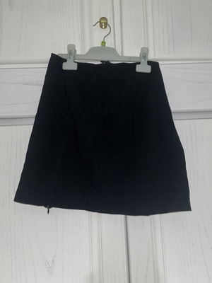M&F black skirt with side and front zippers, size M