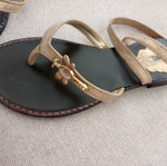 Schutz sandals new, gold color with ankle cords, size 37