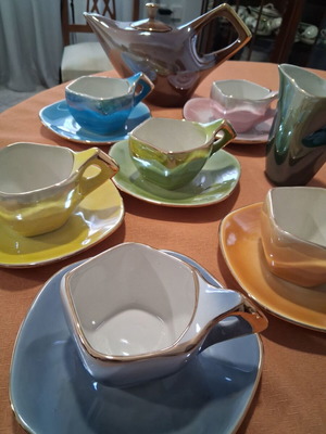 Ceramic tea set like new, 6 cups with saucers, teapot and creamer